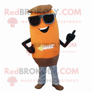 Brown Squash mascot costume character dressed with a Skinny Jeans and Sunglasses