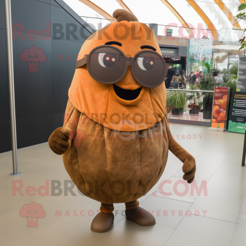 Brown Squash mascot costume character dressed with a Skinny Jeans and Sunglasses