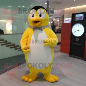 Lemon Yellow Penguin mascot costume character dressed with a Midi Dress and Bracelet watches