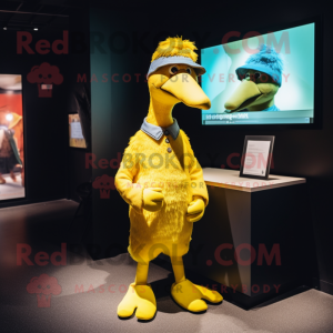 Yellow Dodo Bird mascot costume character dressed with a Dress Shirt and Beanies