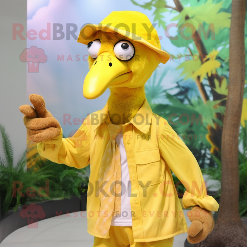 Yellow Dodo Bird mascot costume character dressed with a Dress Shirt and Beanies