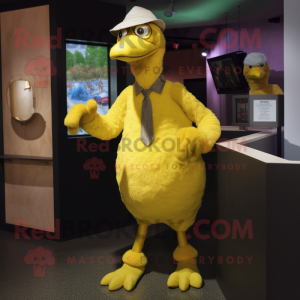 Yellow Dodo Bird mascot costume character dressed with a Dress Shirt and Beanies