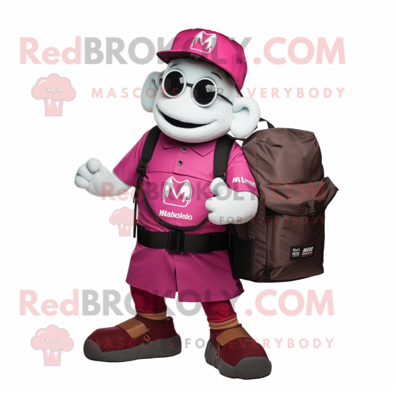 Magenta Camera mascot costume character dressed with a Cargo Shorts and Backpacks