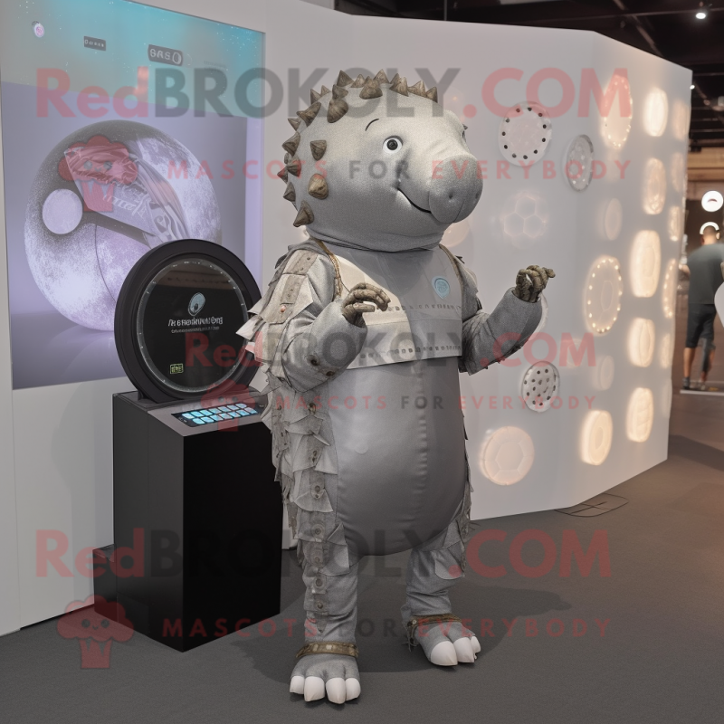 Silver Glyptodon mascot costume character dressed with a Shift Dress and Digital watches