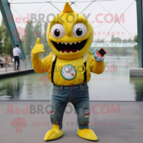 Yellow Piranha mascot costume character dressed with a Jeans and Smartwatches