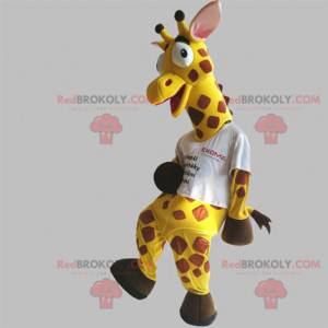 Mascotte de girafe jaune et marron géante et rigolote -