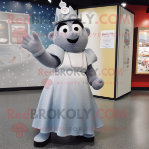 Gray Ice mascot costume character dressed with a A-Line Skirt and Lapel pins