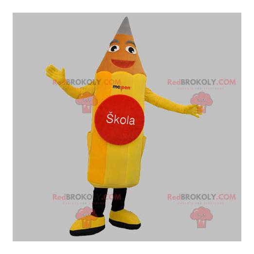 Mascote gigante e sorridente de lápis amarelo - Redbrokoly.com