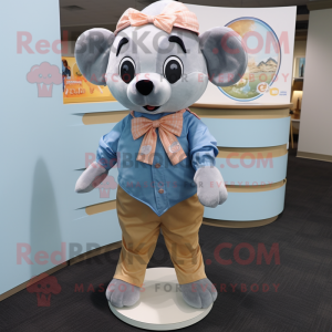 Peach Seal mascot costume character dressed with a Chambray Shirt and Bow ties