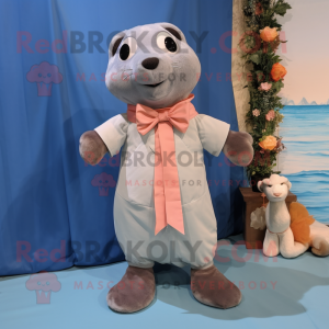 Peach Seal mascot costume character dressed with a Chambray Shirt and Bow ties