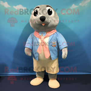 Peach Seal mascot costume character dressed with a Chambray Shirt and Bow ties