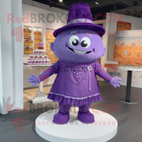 Purple Wedding Cake mascot costume character dressed with a Dungarees and Shawl pins