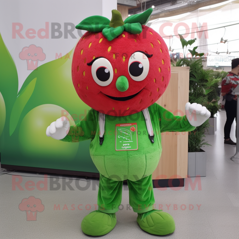 Green Strawberry mascot costume character dressed with a Dungarees and Hair clips