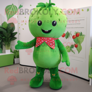 Green Strawberry mascot costume character dressed with a Dungarees and Hair clips