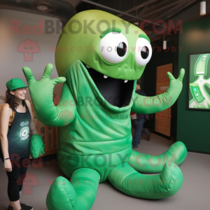 Green Kraken mascot costume character dressed with a Tank Top and Mittens