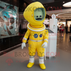 Lemon Yellow Astronaut mascot costume character dressed with a Cover-up and Lapel pins