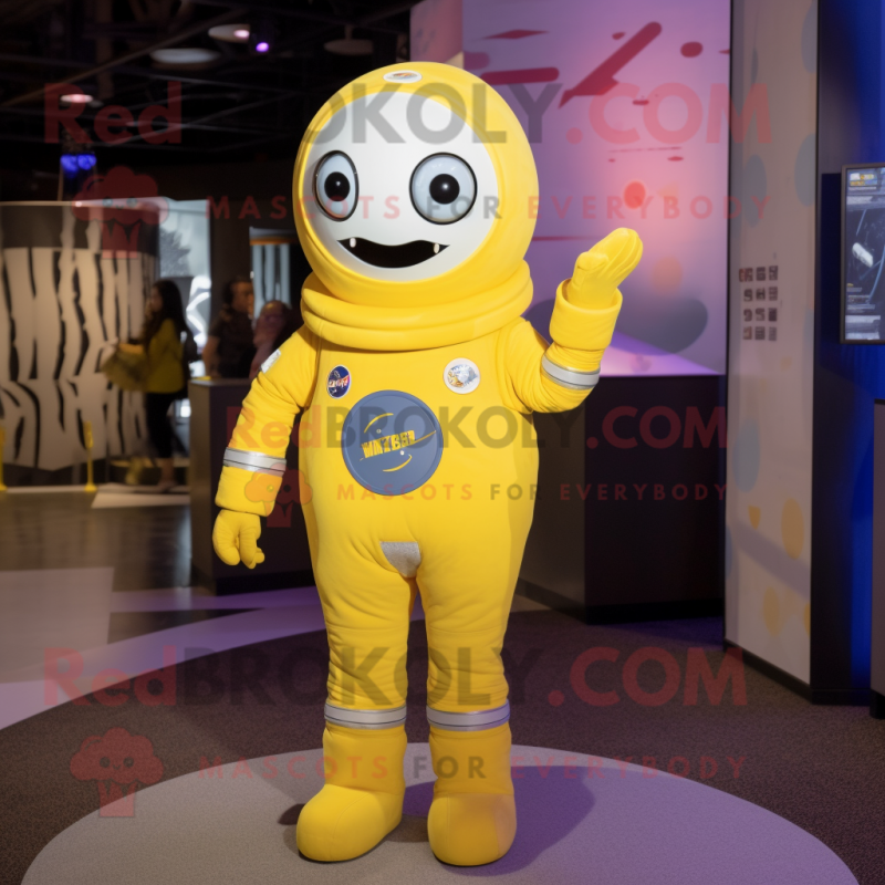 Lemon Yellow Astronaut mascot costume character dressed with a Cover-up and Lapel pins Lemon Yellow Astronaut mascot costume character dressed with a Cover-up and Lapel pins