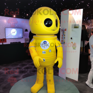 Lemon Yellow Astronaut mascot costume character dressed with a Cover-up and Lapel pins