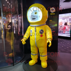 Lemon Yellow Astronaut mascot costume character dressed with a Cover-up and Lapel pins