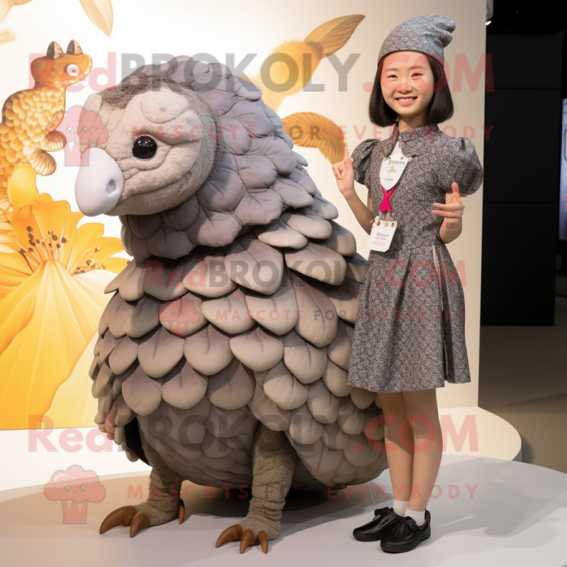 Gray Pangolin mascot costume character dressed with a Mini Dress and Cummerbunds