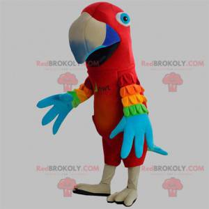 Mascotte de perroquet rouge avec des ailes colorées -