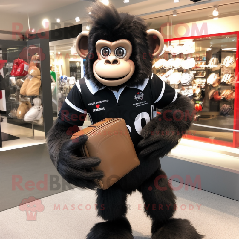 Black Monkey mascot costume character dressed with a Rugby Shirt and Briefcases