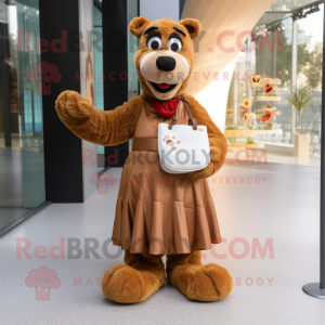 Brown Dog mascot costume character dressed with a Empire Waist Dress and Clutch bags