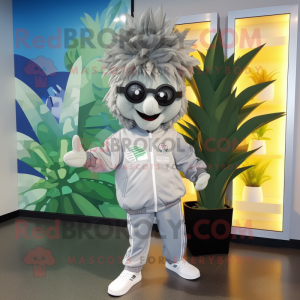Gray Pineapple mascot costume character dressed with a Windbreaker and Hair clips