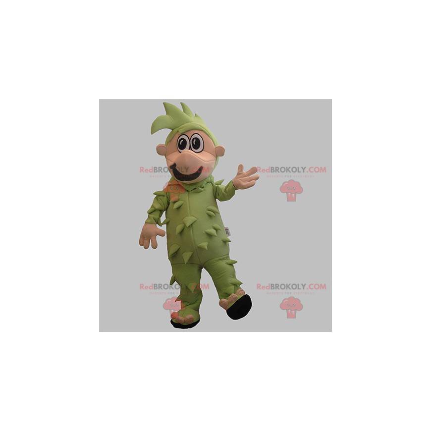 Mascotte de bonhomme habillé en vert avec les cheveux verts -