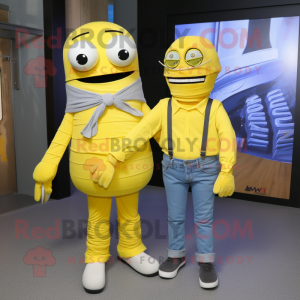 Lemon Yellow Mummy mascot costume character dressed with a Boyfriend Jeans and Bow ties