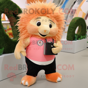 Peach Porcupine mascot costume character dressed with a Skinny Jeans and Clutch bags