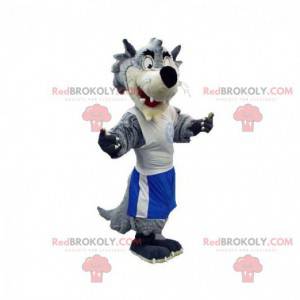 Gray and white wolf mascot dressed in sportswear -