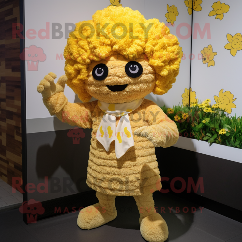 Gold Cauliflower mascot costume character dressed with a Cardigan and Headbands