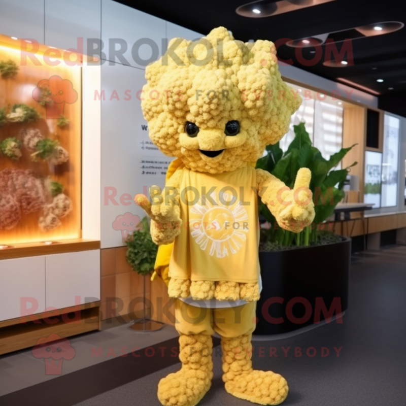Gold Cauliflower mascot costume character dressed with a Cardigan and Headbands Gold Cauliflower mascot costume character dressed with a Cardigan and Headbands