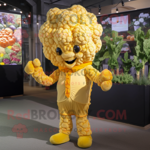 Gold Cauliflower mascot costume character dressed with a Cardigan and Headbands