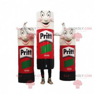 3 mascottes van gigantische rode, zwarte en witte lijmbuizen -
