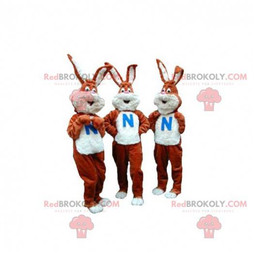 3 mascotte di conigli marroni e bianchi. Set di 3 mascotte -