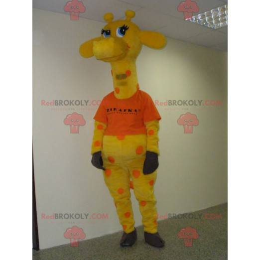 Mascote girafa amarela e laranja com olhos azuis -