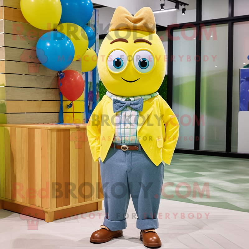 Yellow Candy mascot costume character dressed with a Chambray Shirt and Bow ties Yellow Candy mascot costume character dressed with a Chambray Shirt and Bow ties