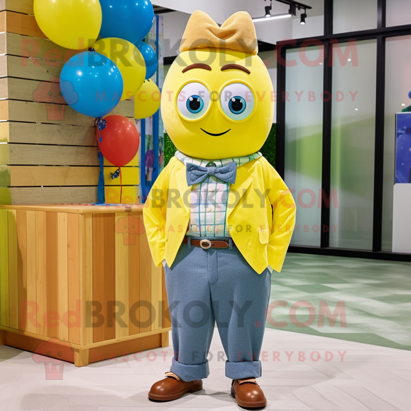 Yellow Candy mascot costume character dressed with a Chambray Shirt and Bow ties