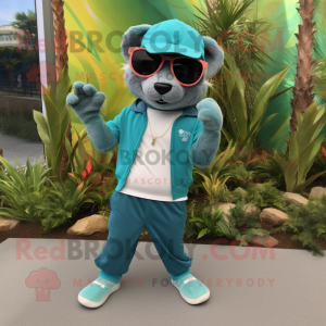 Teal Jaguarundi mascot costume character dressed with a Joggers and Sunglasses
