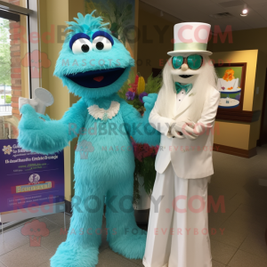 Turquoise Jambalaya mascot costume character dressed with a Wedding Dress and Watches