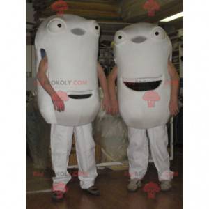 2 mascottes van witte figuren 2 gigantische hoofden -