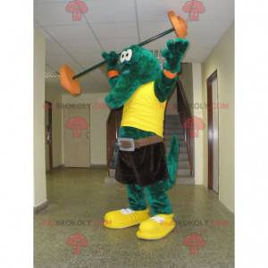 Mascote crocodilo verde com uma camiseta amarela -