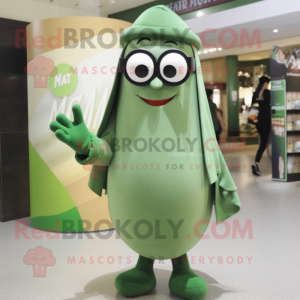 Olive Magician mascot costume character dressed with a Sweater and Eyeglasses