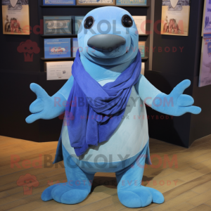 Blue Walrus mascot costume character dressed with a Henley Shirt and Scarf clips