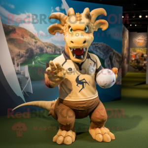 Tan Dragon mascot costume character dressed with a Rugby Shirt and Rings