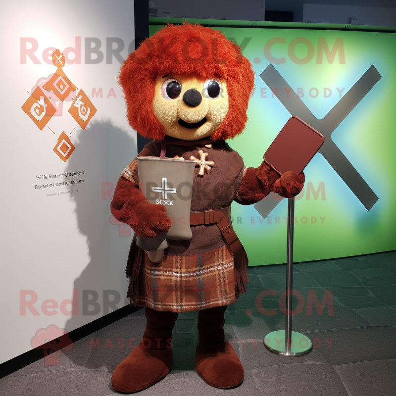 Rust Celtic Cross mascot costume character dressed with a Cardigan and Messenger bags Rust Celtic Cross mascot costume character dressed with a Cardigan and Messenger bags