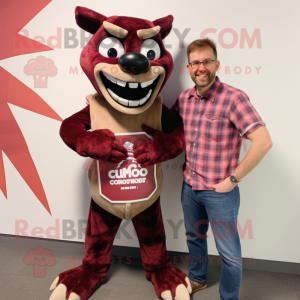 Maroon Chupacabra mascot costume character dressed with a Flannel Shirt and Smartwatches