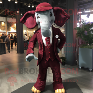 Maroon Elephant mascot costume character dressed with a Dress Shirt and Ties